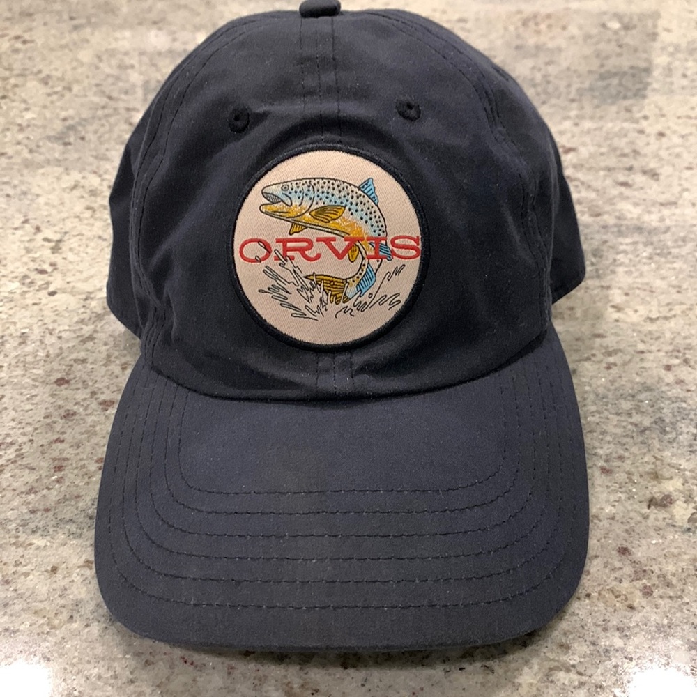 Orvis hat. Navy colored with adjustable strap
